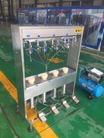 Monobloc de remplissage et de bouchage de bière semi-automatique |   Machine de mise en bouteille pour microbrasserie à contre-pression