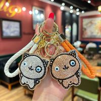 Porte-clés chat en strass mignon en gros, breloque chat scintillante en cristal, pendentif de sac en corde tressée à la main pour accessoires de sac à main pour femmes