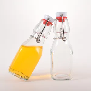 Mini bouteilles de stockage de bouteilles en verre transparentes carrées de 130ml avec étiquettes et ficelle personnalisées pour l'artisanat
