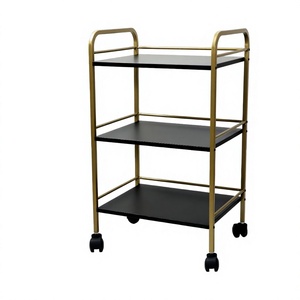 Chariot de service hôtelier à roulettes avec 3 étagères, cadre doré, plateau noir, mobilier commercial durable, design contemporain - Product Image 1