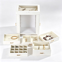 Boîte de rangement à bijoux en cuir PU personnalisée en gros avec miroir et plusieurs tiroirs
