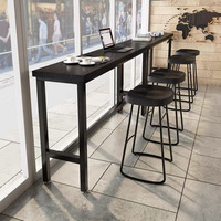 Table de bar industrielle longue en bois massif carbonisé noir avec structure métallique pour café, restaurant, maison, côté fenêtre