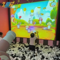 Mur de projection interactif pour divertissement, avec fonction de frappe immersive de balles magiques