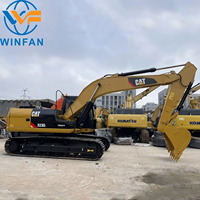Excavatrice sur chenilles hydraulique Caterpillar 323DL d'occasion avec pompe à engrenages pour l'excavation minière, 23 tonnes, 110 kW