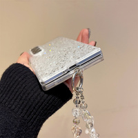 Étui de téléphone chic et élégant en paillettes argentées brillantes pour Samsung Galaxy Z Fold 7-4, avec sangle en perles et nœud en cristal pour Z Flip 7-3