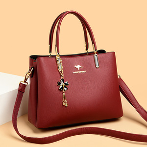 Bolso Bandolera de Gran Capacidad para Mujer con Múltiples Compartimentos y Colgante Decorativo - Product Image 3