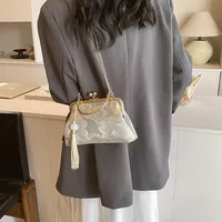 Sac à bandoulière élégant pour femme, pochette de style chinois, sac à chaîne pour femme, sac à main décontracté pour filles, avec pendentif à pompon
