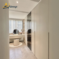 Système de dressing intégré Prestige moderne et minimaliste blanc avec poste de toilette intégré et armoire pleine hauteur