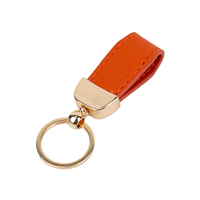 Porte-clés en cuir gaufré de luxe pour clés de voiture de luxe avec design personnalisé et détails en feuille d'argent Cadeau