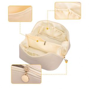 กระเป๋าเครื่องสำอางแบบพกพาปี 2024 กันน้ำ ขนาดใหญ่ ทำจากหนัง PU สำหรับผู้หญิง กระเป๋าใส่เครื่องสำอางคุณภาพสูงพร้อมช่องแบ่ง - Product Image 6