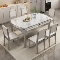 Ensemble table et chaises de salle à manger rectangulaire extensible moderne de luxe avec plateau en pierre frittée écologique et pieds en bois pour restaurant