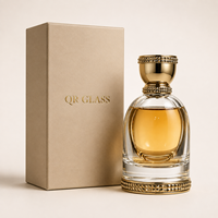 Flacons de parfum ronds en verre de luxe avec couvercle rond transparent doré 100 ml avec tête de pulvérisation à pompe avec boîte d'emballage