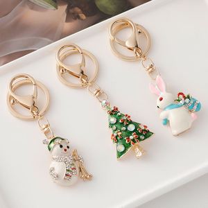 Vente en gros en ligne du fabricant : Porte-clés mignons en forme de sapins de Noël et de bonhommes de neige, avec broche double usage à finition émaillée pour décorations - Product Image 1
