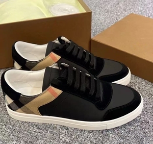 Chaussures de marche basses simples et élégantes d'une marque de luxe, avec semelles souples et style rétro, idéales pour l'été. - Product Image 1