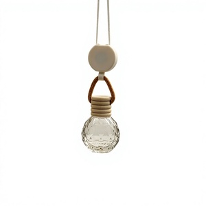 Diffuseur d'air pour voiture en verre rond avec poignée en corde, design cristal transparent, pendentif parfum d'intérieur - Product Image 1