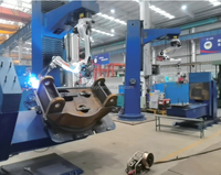 Station de soudage robotisée à commande facile pour bras de robot de soudage, destinée à l'industrie de la fabrication de cadres de vélos, de machines à souder et de conteneurs métalliques