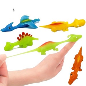 Wholesale 15pcs <strong>Slingshot</strong> Dinosaur Finger Stick Wall Christmas Funny Prank Gift Gags Practical Jokes Toys - Product Image 1