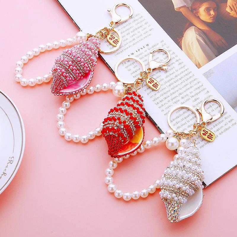 Conque de chaîne de perle de couleur aléatoire