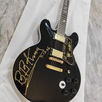 Guitare électrique noire de haute qualité avec corps en acajou, manche en érable, configuration de micros H-H, élégance et sophistication haut de gamme