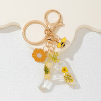 Porte-clés pendentif abeille marguerite jaune avec pompon et fleurs de chrysanthème séchées pour sac à dos