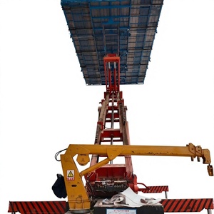 Plateforme élévatrice à chenilles avec plateau porte-outils pour l'installation de plafonds inversés et de conduits en hauteur - Product Image 1