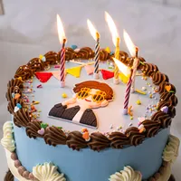צבעוני קסם הצית שוב את נרות יום הולדת עוגת נרות