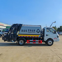 Camion Compacteur à Ordures Dongfeng 4x2 Prix Usine Grande Capacité Conception Durable Idéal pour les Opérations d'Assainissement Urbain