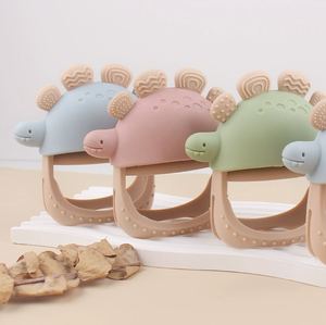 2025 New Dinosaur Teething Mitt Anti-Hand Chewing Glove for Babies Bpa-Free Silicone Chew Toy with Dino Spikes for Soothing - Product Image 1