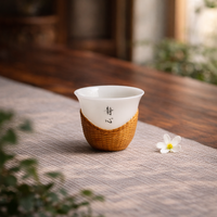 Tasse à thé en céramique de porcelaine de jade tressée en bambou de qualité supérieure, résistante à la chaleur et anti-brûlure, réutilisable et écologique, idéale pour les cadeaux promotionnels.