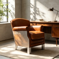Fauteuil club en cuir style aviateur, fauteuil industriel avec coque en aluminium et rivets, couleur cognac marron, pour salon ou hôtel