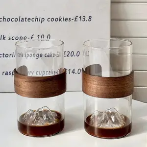 पारदर्शी ग्लास कॉफी कप बांस और लकड़ी इन्सुलेशन सेट ग्लास माउंटेन कप