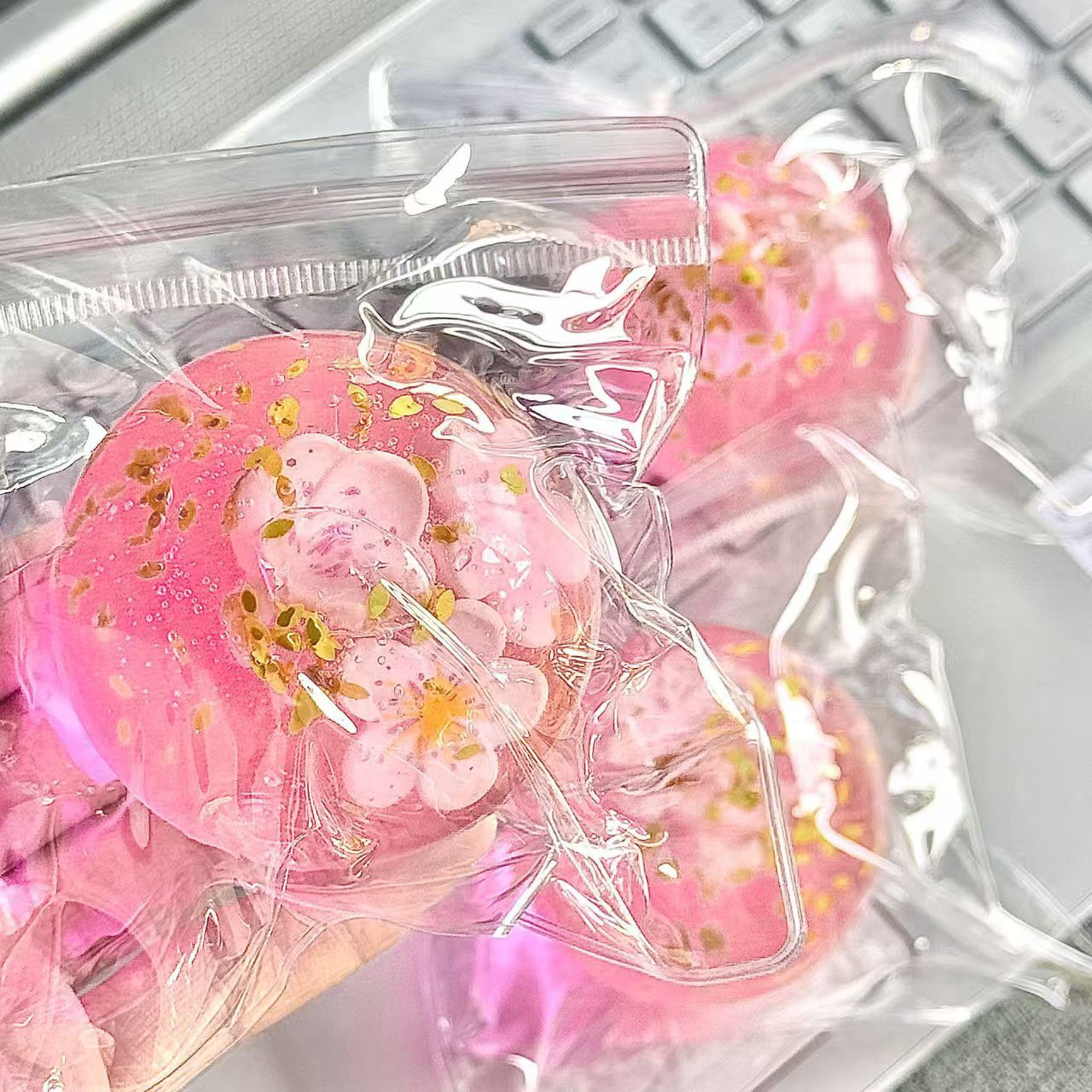 Pompons fleurs de cerisier [sac PVC]