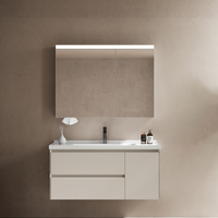 Kabinet kamar mandi Solid pemasangan dinding Modern dengan cermin pintar wastafel keramik penyimpanan ganda laci senyap untuk Hotel