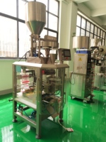 Machine à emballer verticale de granule à grande vitesse Machine à emballer de tasse à mesurer 3 côtés scellant le sachet d'étanchéité arrière de sac pour des écrous
