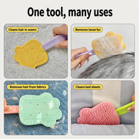 Peigne de massage portable en silicone pour animaux de compagnie, design patte de chat, autonettoyant, outil doux de toilettage et de démêlage pour chats et chiens, pour le bain à domicile