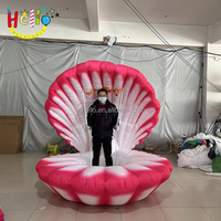 Chaise géante gonflable en forme de coquille de sirène pour la promotion des parcs d'attractions, la décoration d'événements et l'affichage de décors