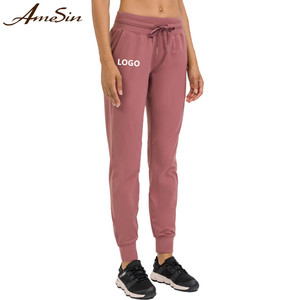 Pantalones de chándal para correr de tela deportiva transpirable para mujer profesional 2023 con bolsillo con cordón de secado rápido para entrenamientos - Product Image 1