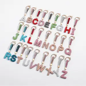 Venta al por mayor de alta calidad de cristal de diamantes de imitación DIY llavero hermoso Keyrope Blingbling 26 letras completo diamante alfabeto llavero