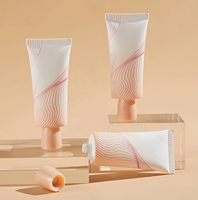 Emballage personnalisé en tube plastique ovale pour cosmétiques avec bouchon à vis rond unique en forme de bol pour crème isolante, émulsion, crème pour les mains, crème solaire