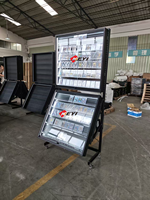 Présentoir rotatif moderne pour cartes avec éclairage LED, rail repositionnable, construction en métal et acrylique pour la vente au détail et en gros