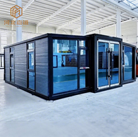 Maison conteneur modulaire en acier évolutive, conception à porte coulissante, bonne respirabilité, installation rapide pour bâtiments de bureaux