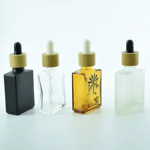 Botella de vidrio esmerilada, gotero rectangular de color negro con tapa de bambú, en oferta