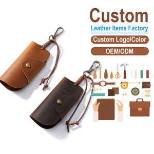 กระเป๋าใส่กุญแจหนังแท้ลาย Crazy Horse สำหรับผู้ชาย รุ่นใหม่ งานแฮนด์เมดสไตล์วินเทจ พร้อมกระดุมแป๊กและคลิปคาราไบเนอร์ - Product Image 1