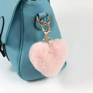 Portachiavi Pom Pom in pelliccia di coniglio a forma di cuore con pompon a forma di cuore