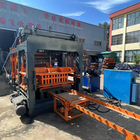 Renseignez-vous sur Qt10-15 Machine automatique de fabrication de briques en béton de ciment Production à grande capacité de briques à feu libre pour Kerbston