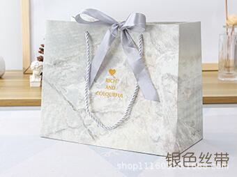 White cardboard; 067 silver ribbon; Increase by 42*15*30