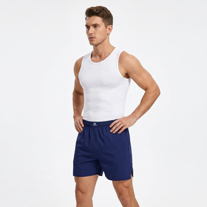 Débardeur blanc pour homme avec short bleu marine, coupe athlétique, idéal pour la gym, l'entraînement et les arts martiaux (shorts MMA) - Product Image 1