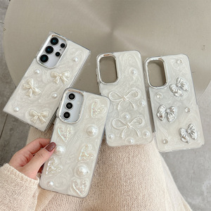 <span class=keywords><strong>Coque</strong></span> de téléphone 3D avec nœud en perles et cœur pour <span class=keywords><strong>Samsung</strong></span> S25 ultra S24 S23 A05 A16 07, design personnalisé avec paillettes époxy, vente en gros d'usine - Product Image 2