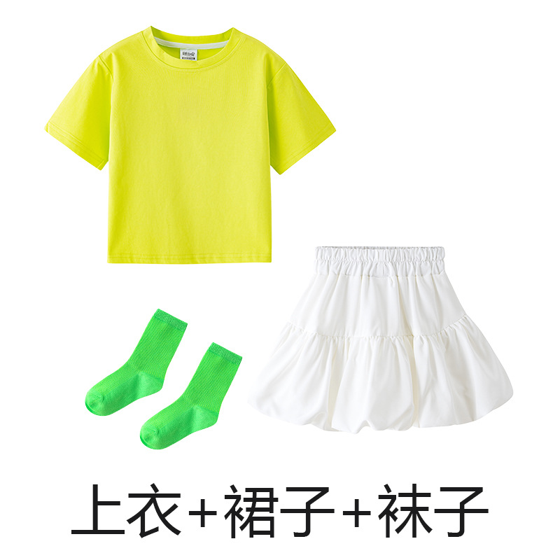 Light green T-shirt, white skirt, green socks