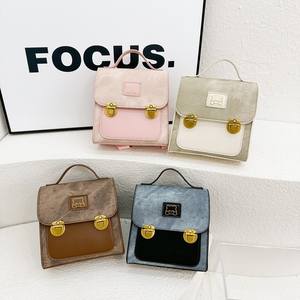 Versión coreana lindo oso bebé maletín niños Color contrastante mochila PU jardín de infantes portátil mochila de dibujos animados - Product Image 1